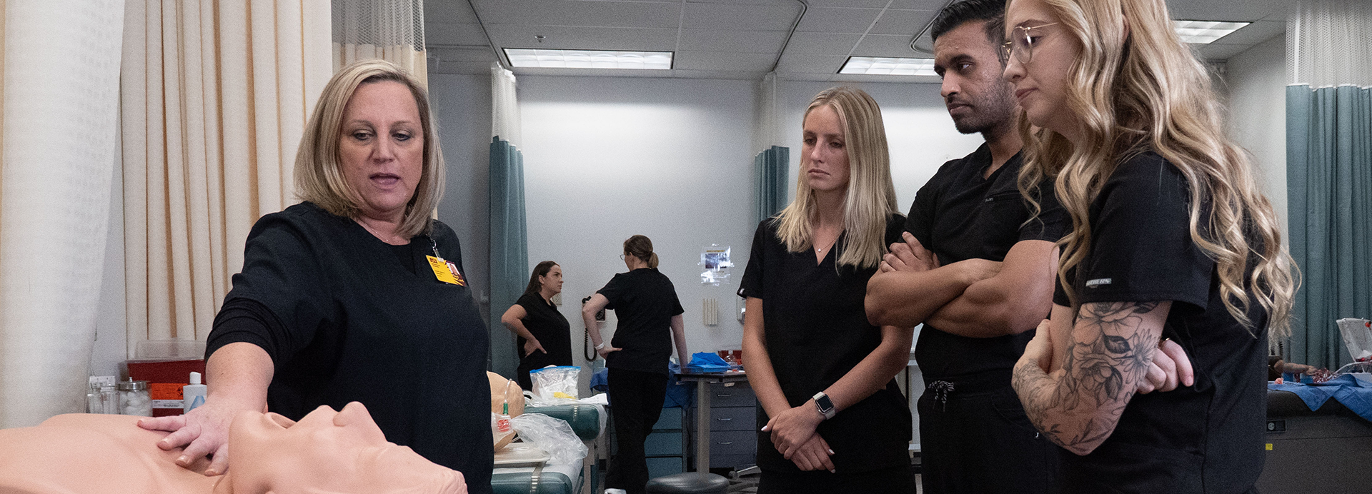 ASU Nursing professor lecturing a sim lab