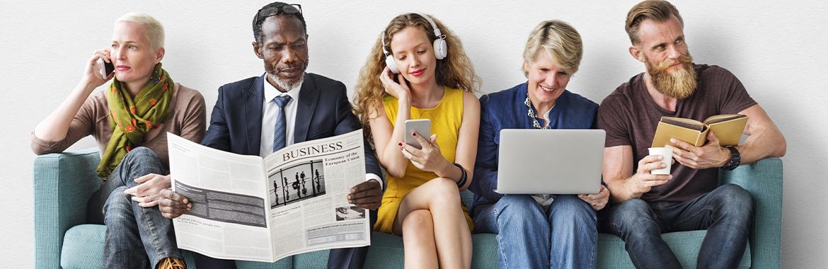 Diverse group of people reading on different formats