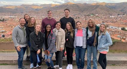 ASU students and faculty pose as a group after arriving in Lima, Peru.