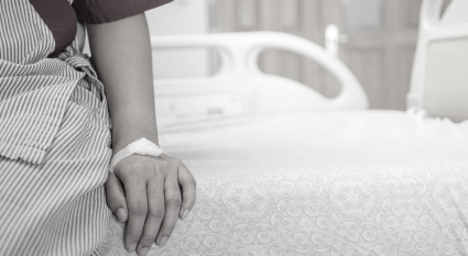 hand on bed
